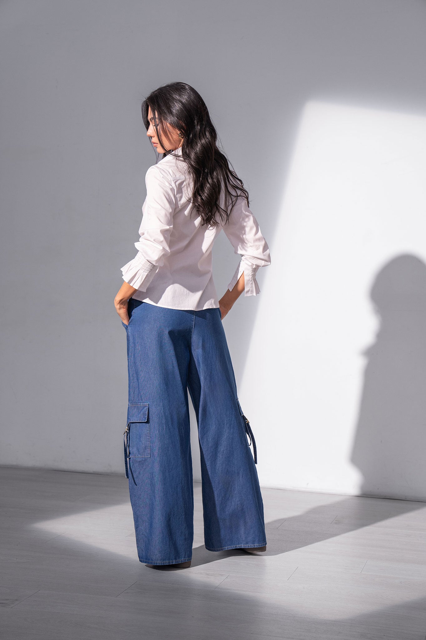 Blusa manga larga con alforzas y perilla
