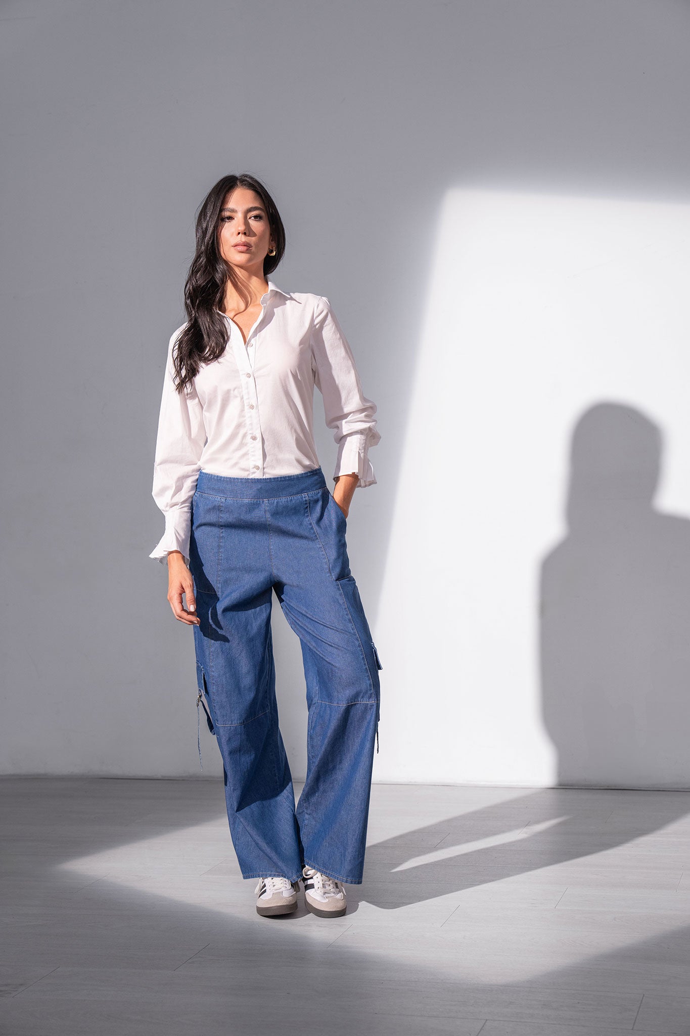 Blusa manga larga con alforzas y perilla
