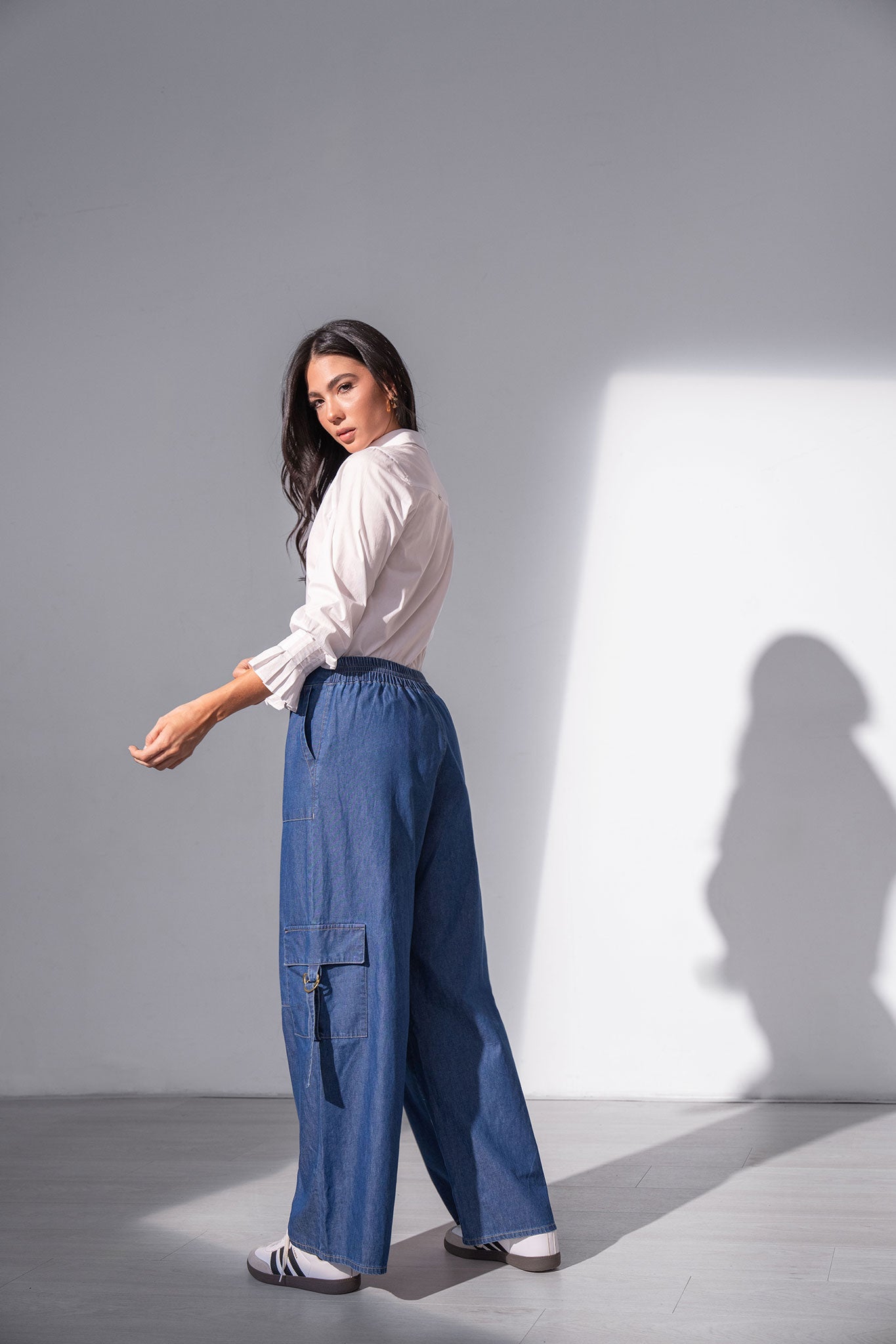 Blusa manga larga con alforzas y perilla