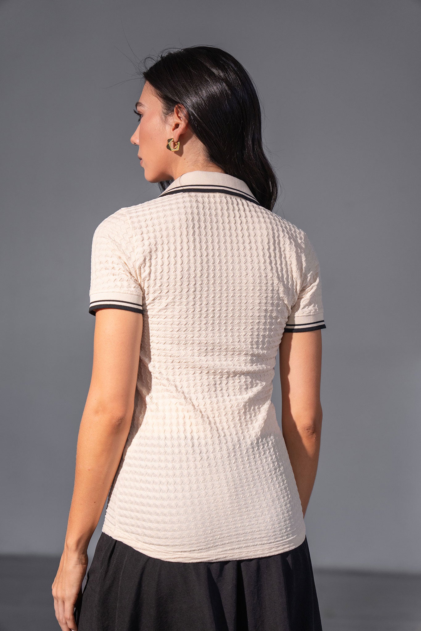 Camiseta tipo polo con tejidos