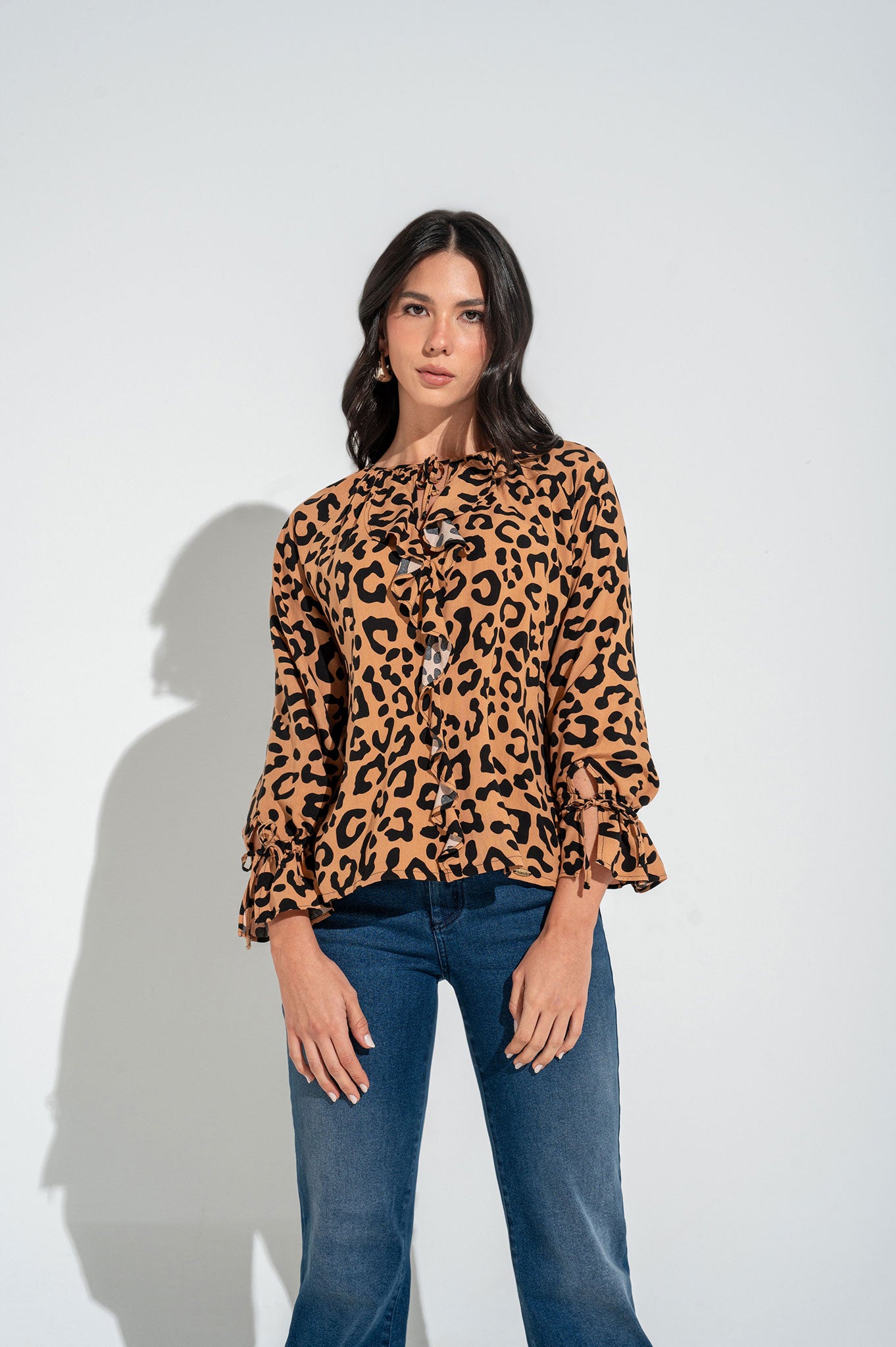 Blusa manga ranglan con bolero en puños