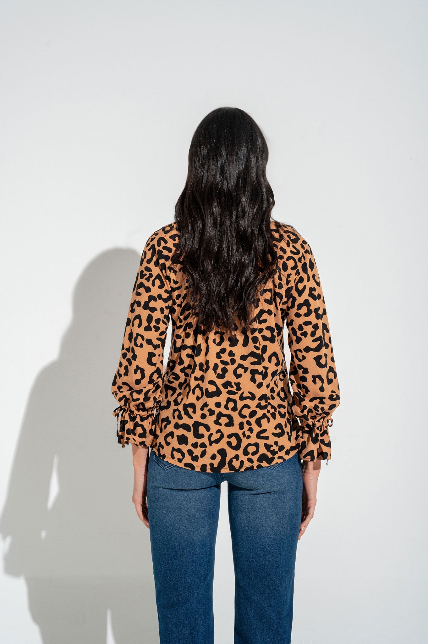 Blusa manga ranglan con bolero en puños