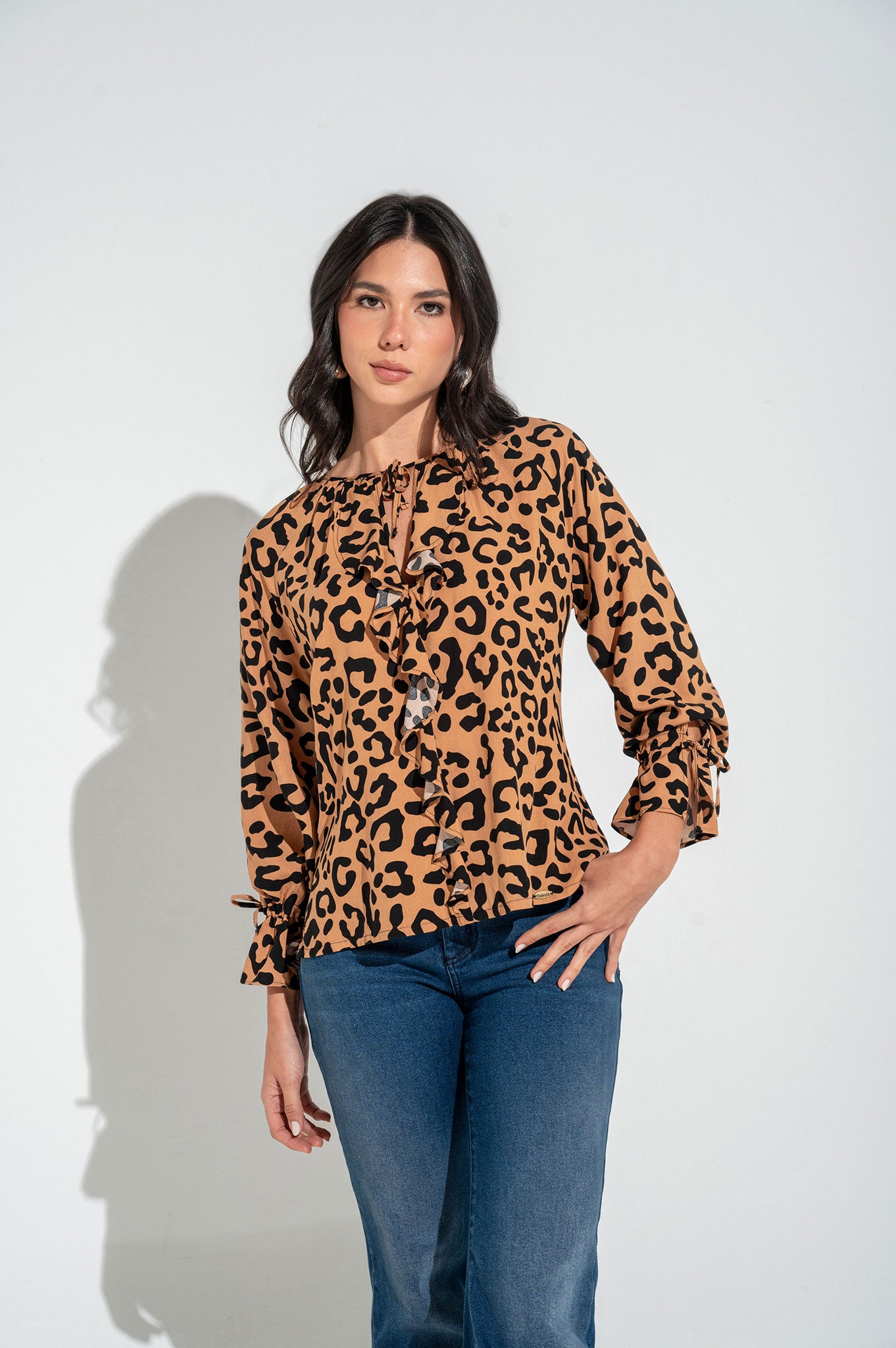 Blusa manga ranglan con bolero en puños