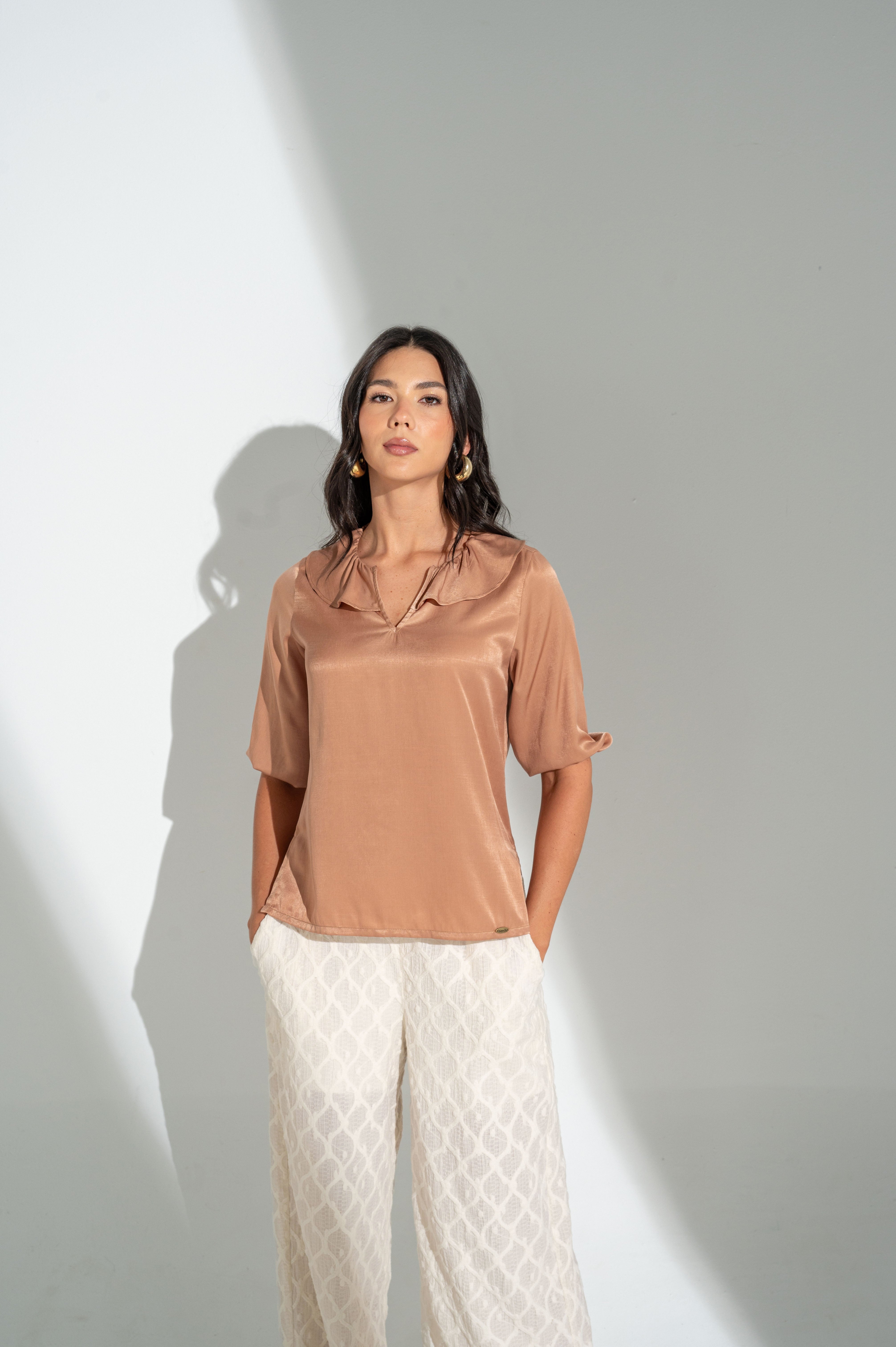 Blusa manga 3/4 elástico en puños.