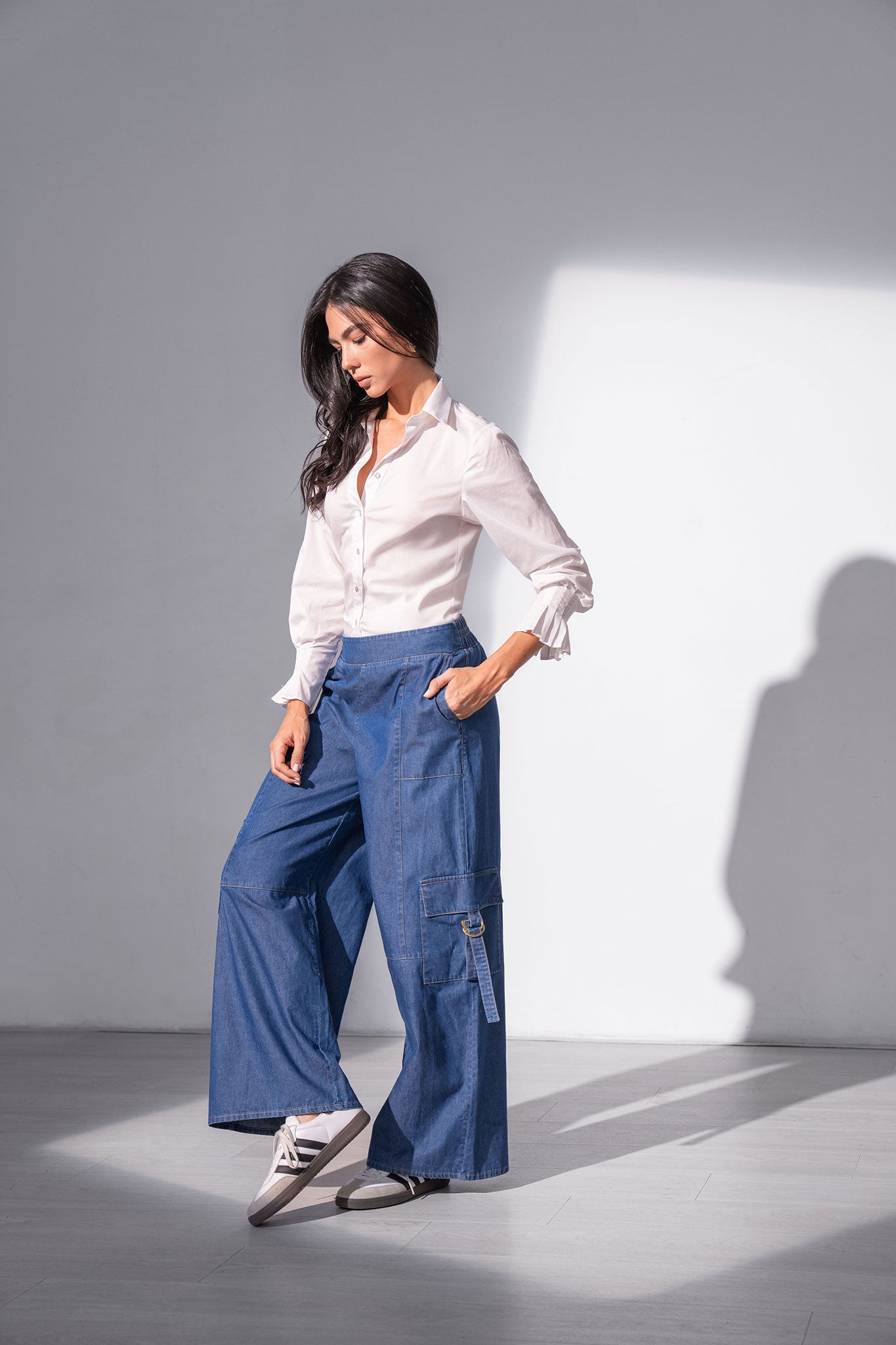 Blusa manga larga con alforzas y perilla