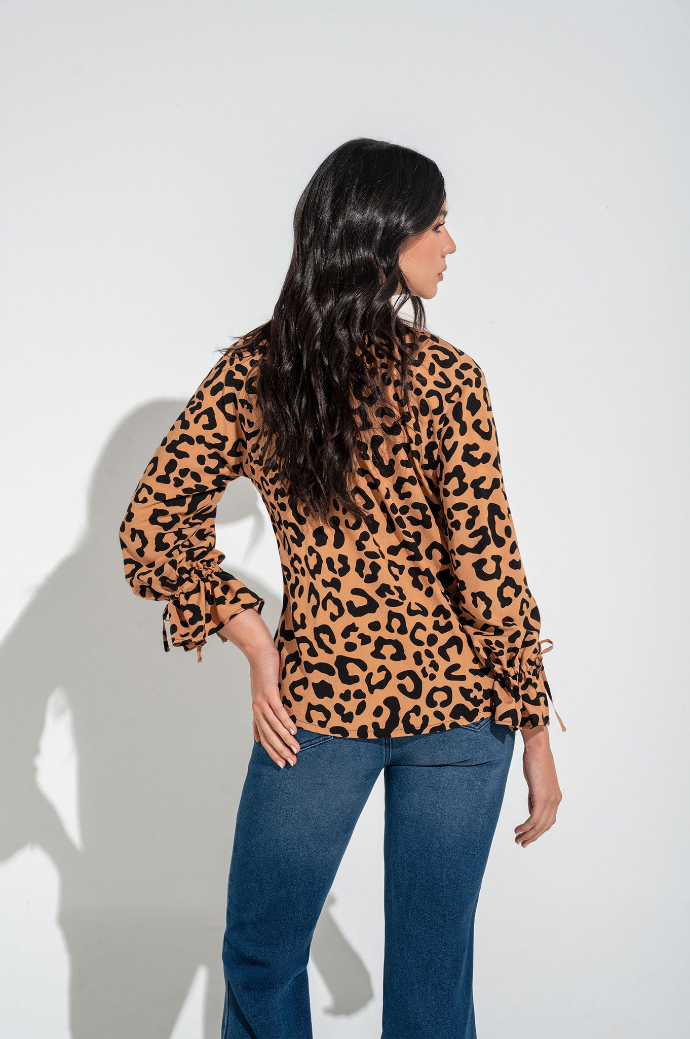 Blusa manga ranglan con bolero en puños